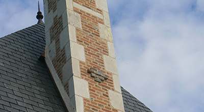 Cheminée en croupe de toiture